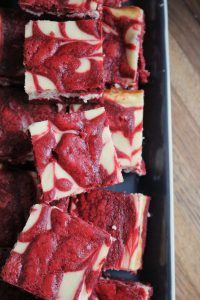 Stack of Red Velvet Cream Cheese Swirl Brownies.