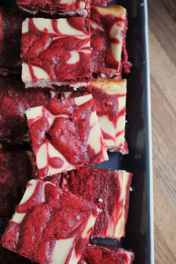 Stack of Red Velvet Cream Cheese Swirl Brownies.