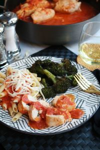 Chicken Scaloppine with Sage and Fontina Cheese Served with Penne and Broccoli.