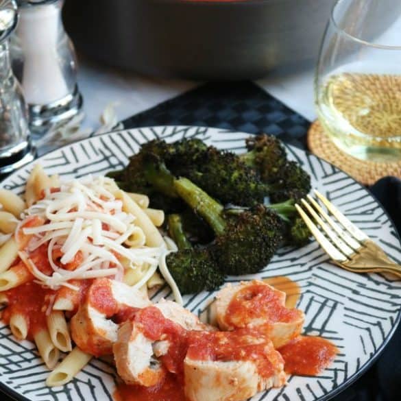 Chicken Scaloppine with Sage and Fontina Cheese Served with Penne and Broccoli.