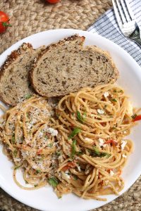 Spaghetti with Feta and Sun-Dried Tomatoes, side of Sliced Bread.