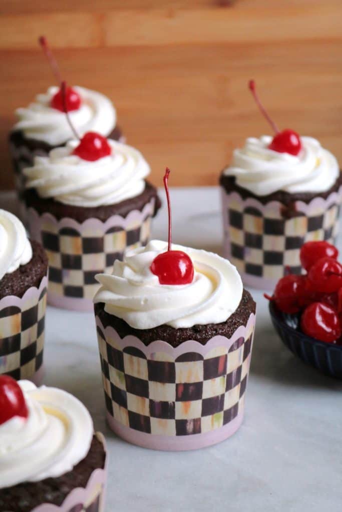 Black Forest Stuffed Cupcakes with a Cherry on top.