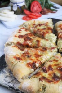 Tomato-Pesto Pizza with Basil and Goat Cheese Stuffed Crust #caprese