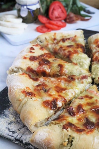 Tomato-Pesto Pizza with Basil and Goat Cheese Stuffed Crust #caprese