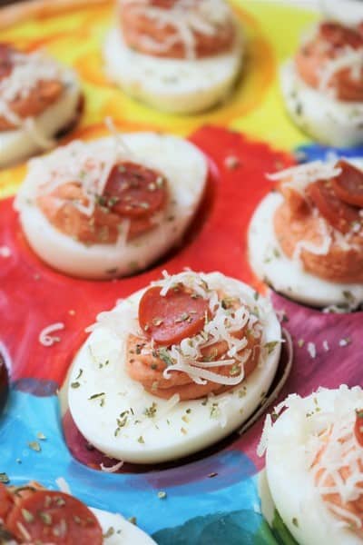 Pepperoni Pizza Deviled Eggs by The Spiffy Cookie #recipe #thespiffycookie #deviledeggs