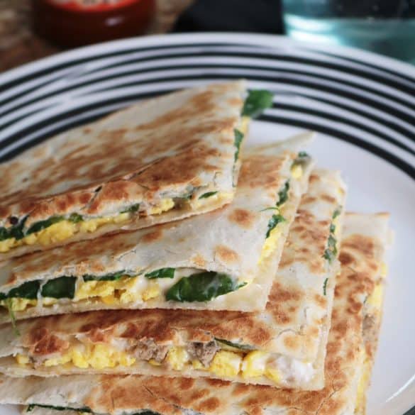 Breakfast Quesadillas with sausage, egg, spinach, and cheese.