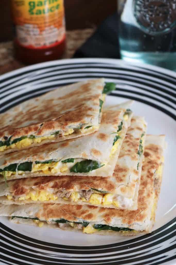 Breakfast Quesadillas with sausage, egg, spinach, and cheese.