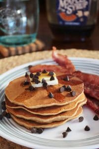 Oatmeal Cookie Pancakes stacked on a plate.