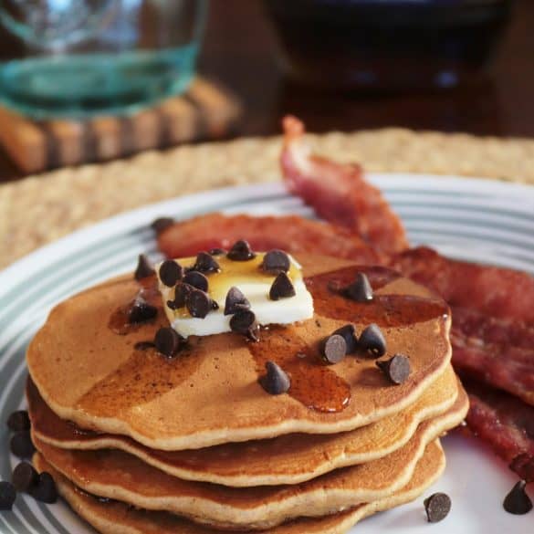 Oatmeal Cookie Pancakes stacked on a plate.
