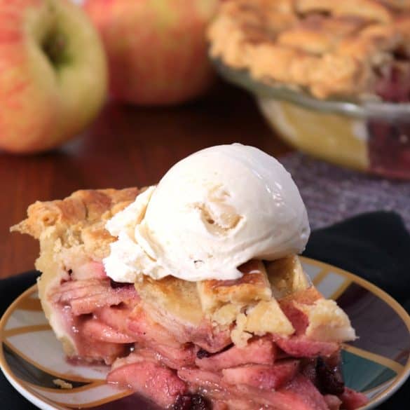 Slice of Apple Blackberry Pie.