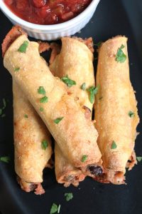 Gluten-Free and Vegetarian Bean and Cheese Taquitos with Salsa.