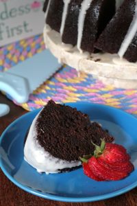Slice of Chocolate Root Beer Bundt Cake on a plate.