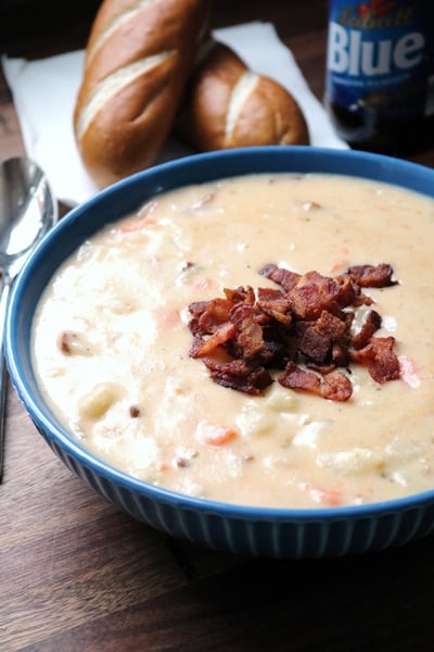 Cheddar Baked Potato Soup topped with crispy bacon.