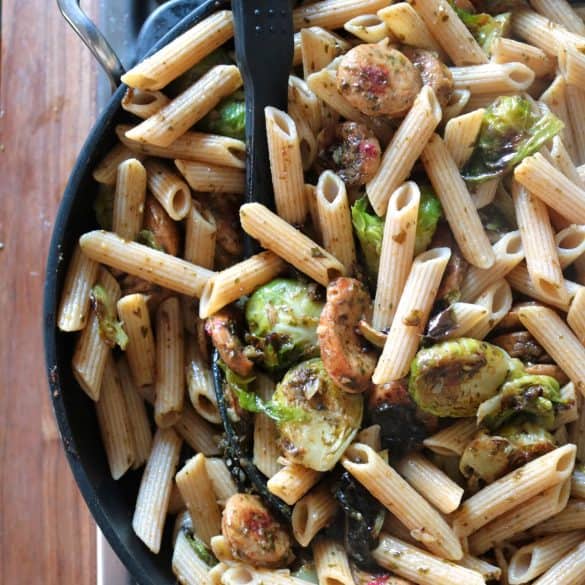 Pesto Pasta with Chicken Sausage & Roasted Brussels Sprouts in a Skillet.