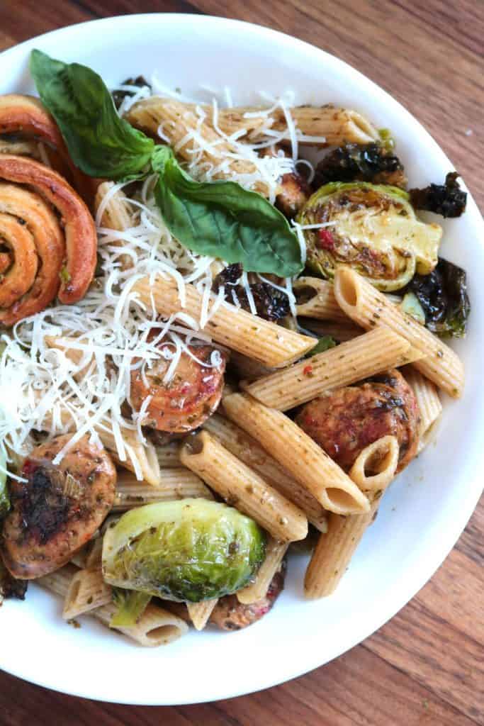 Pesto Pasta with Chicken Sausage & Roasted Brussels Sprouts with Garlic Roll.