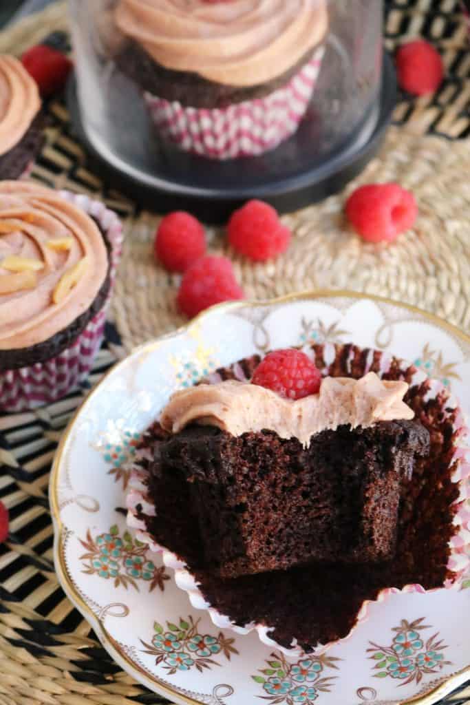 Bite into Gluten-Free Chocolate Almond Cupcakes with Raspberry Almond Butter Frosting.