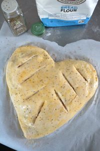 Before cooking: Sausage Lasagna Heart Calzone.