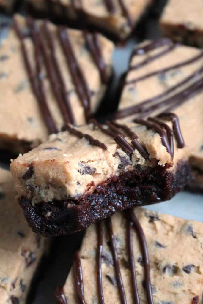 Chocolate Chip Cookie Dough Brownie with teeth marks.