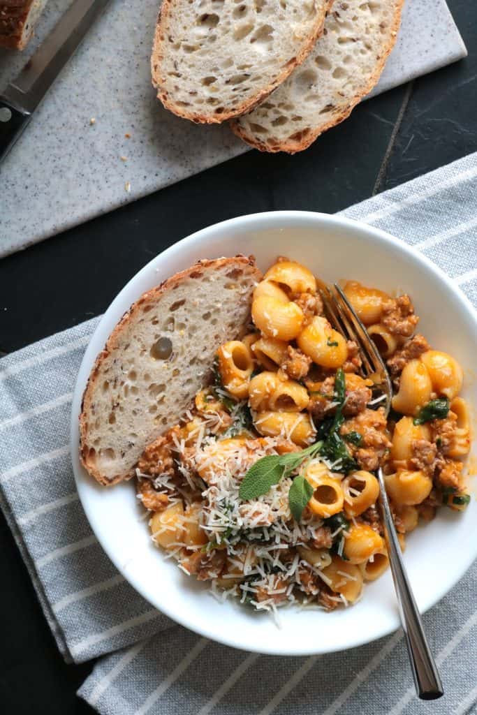 Pasta with Butternut Sauce, Spicy Sausage and Baby Spinach - bread on the side.