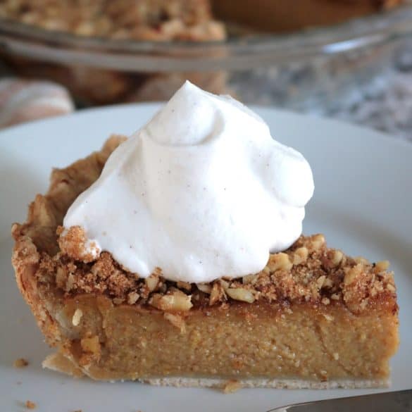 Pumpkin Pie with Brown Sugar-Walnut Topping and Fresh Whipped Cream.