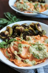 Sun-Dried Tomato Ravioli with Basil Cream Sauce.