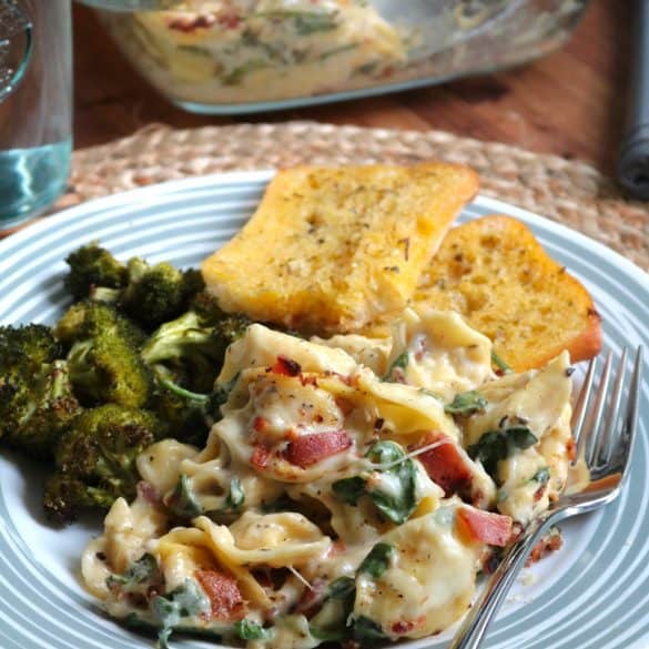 Tortellini Spinach Bake in Creamy Meyer Lemon Sauce with Garlic Bread on the side.