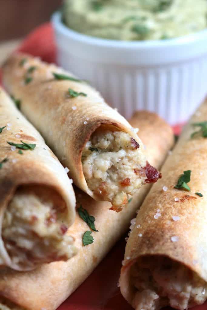 Chicken Bacon Ranch Taquitos served with Avocado Ranch.