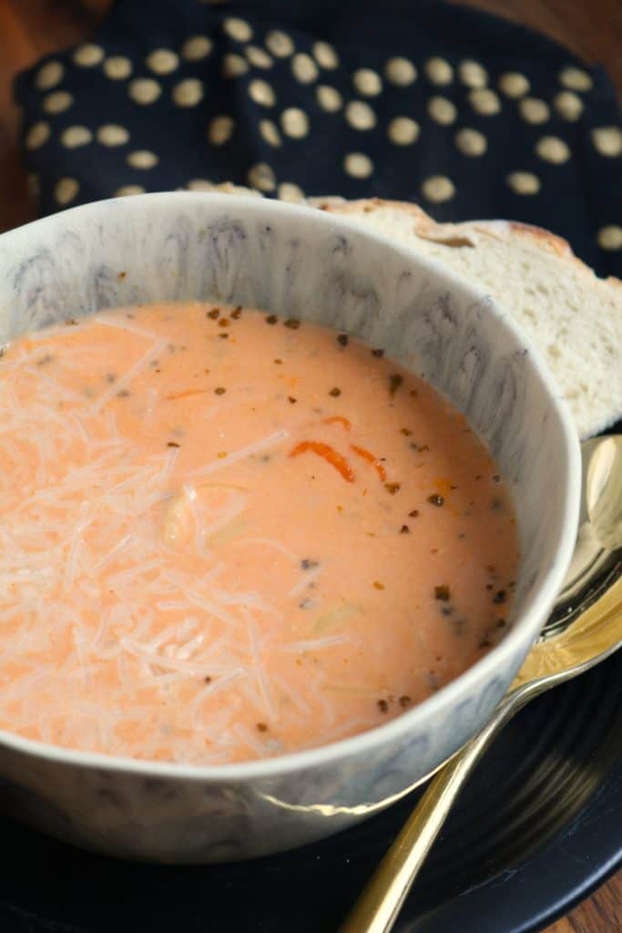 Bowl of Creamy Tomato Tortellini Soup.