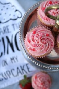 Fresh Strawberry Stuffed Cupcakes with Fresh Strawberry Frosting.