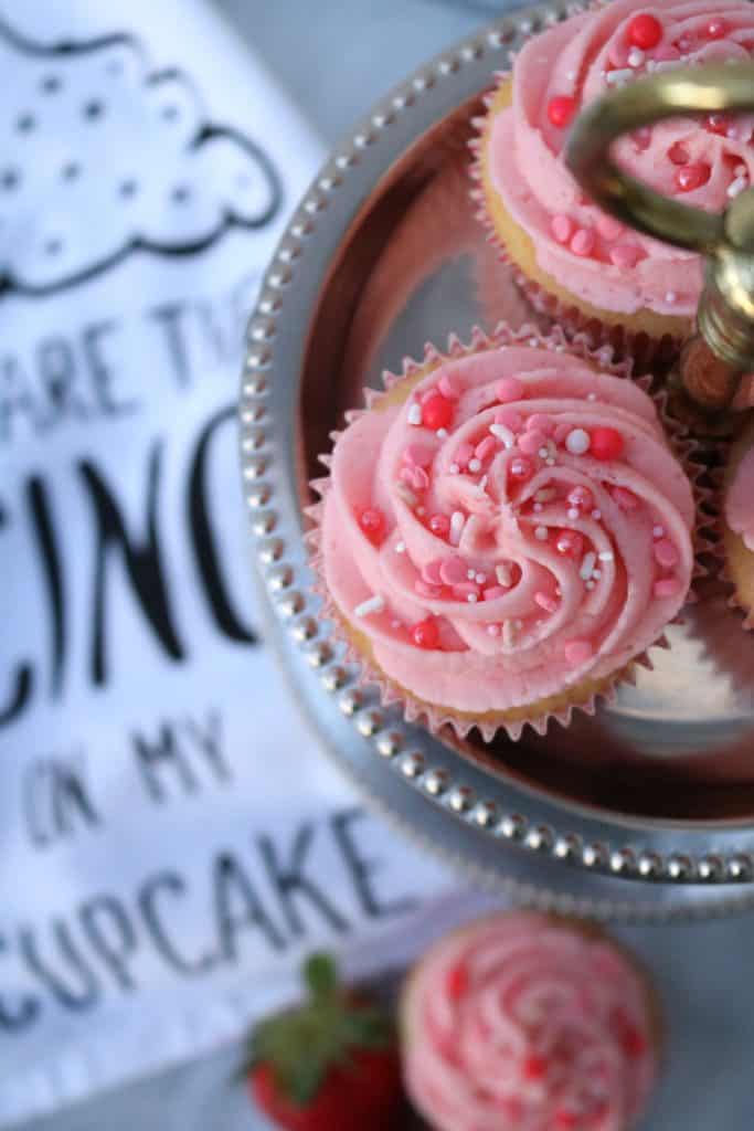 Fresh Strawberry Stuffed Cupcakes with Fresh Strawberry Frosting.