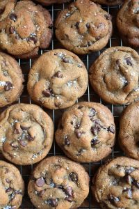 Nutella-Stuffed Brown Butter Chocolate Chip Cookies on Rack.