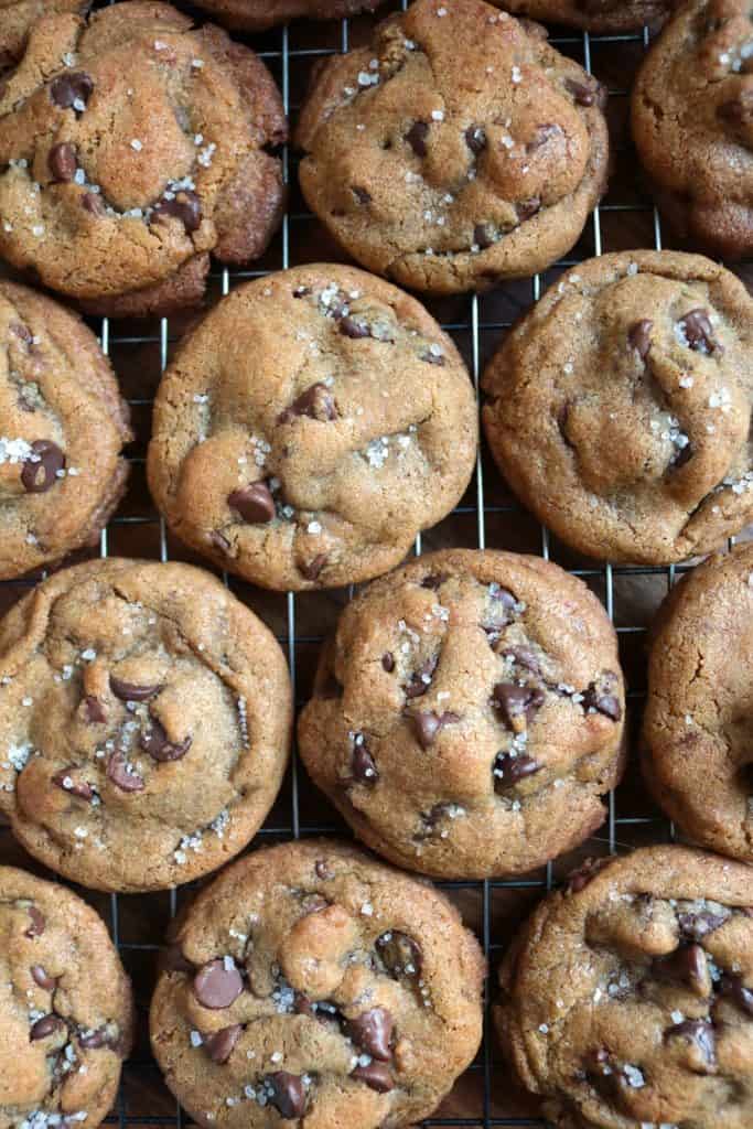 Nutella-Stuffed Brown Butter Chocolate Chip Cookies on Rack.