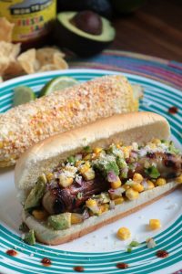 Mexican Hot Dogs with Corn Salsa and Chipotle Cream, served with Street Corn.