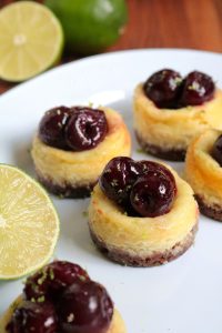 Mini Cherry-Lime Greek Yogurt Cheesecakes.