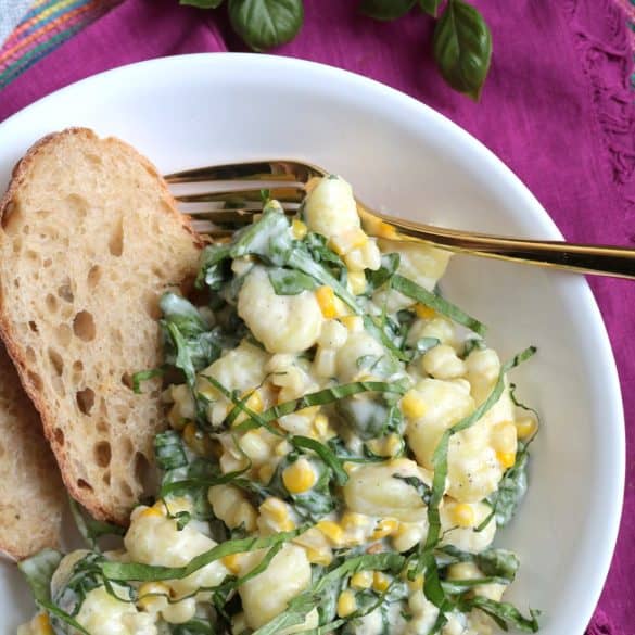 Gnocchi, Sweet Corn & Arugula in Cream Sauce.