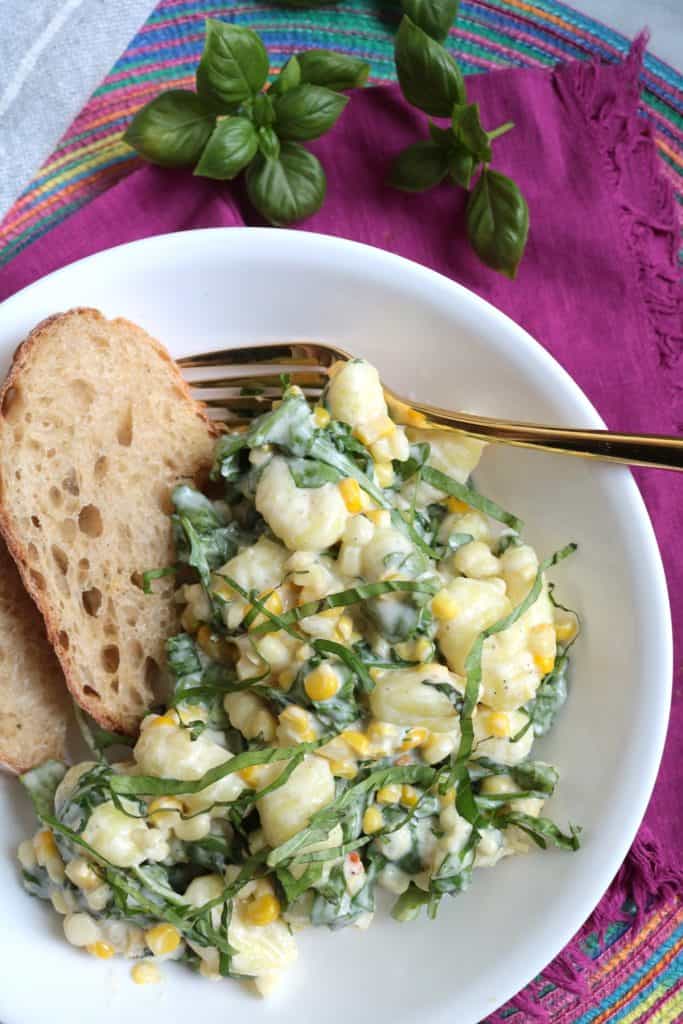 Gnocchi, Sweet Corn & Arugula in Cream Sauce.