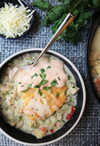 Ghost Chili with Cornbread Topping and Chipotle Crema #chili #whitechili