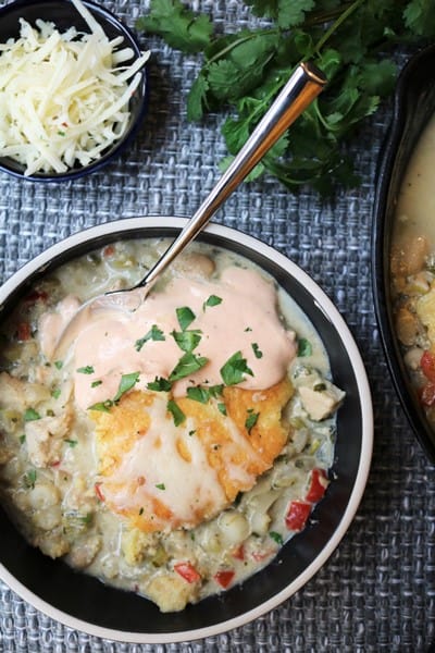 Ghost Chili with Cornbread Topping and Chipotle Crema #chili #whitechili