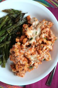 Skillet Lasagna on a plate with Roasted Asparagus.