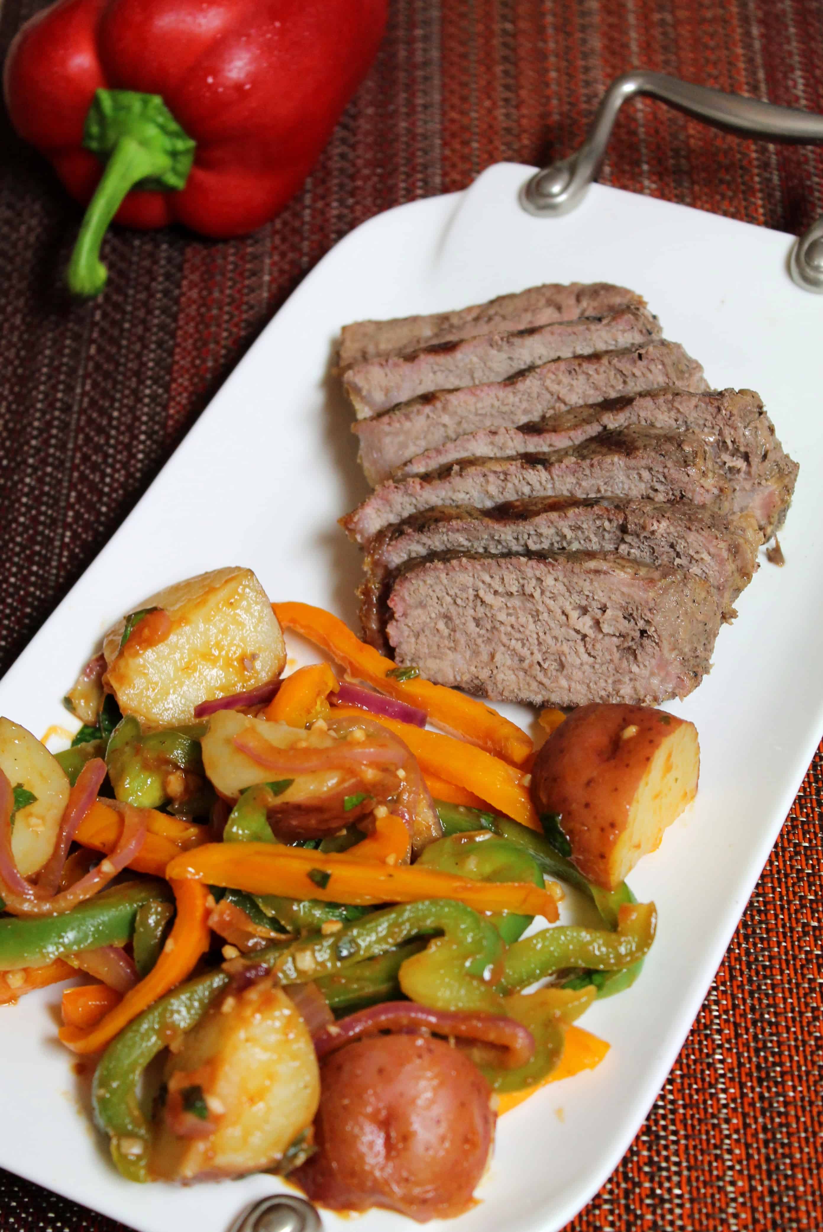 https://www.thespiffycookie.com/wp-content/uploads/2014/05/Grilled-Steak-with-Peppers-and-Potatoes.jpg