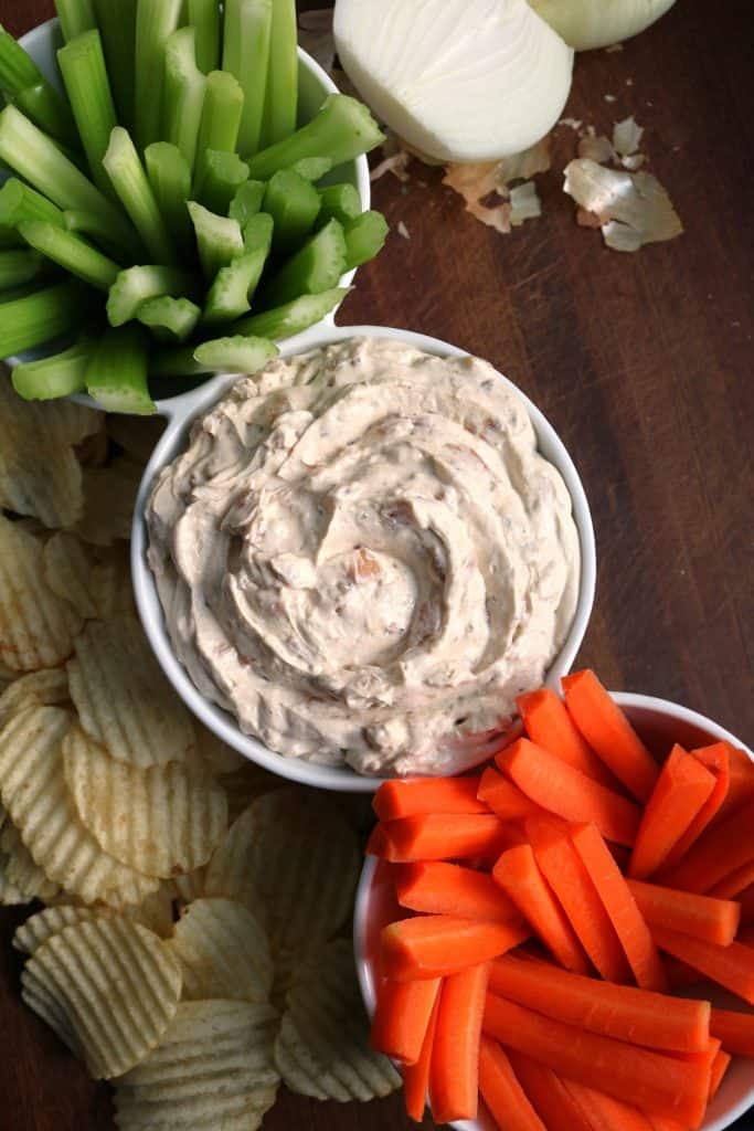 Caramelized Onion Dip with Celery and Carrots.