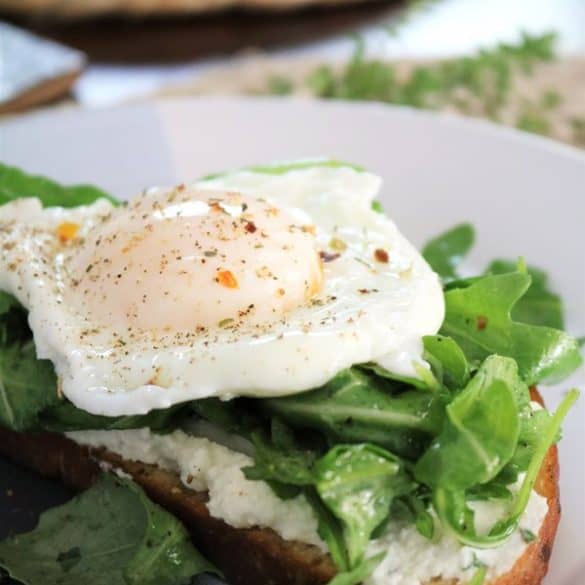 Open-Faced Ricotta, Arugula, and Egg Sandwiches (Ricotta Toast).