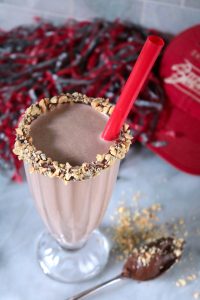 Dark Chocolate Peanut Butter Banana Smoothie with Peanut Rim.