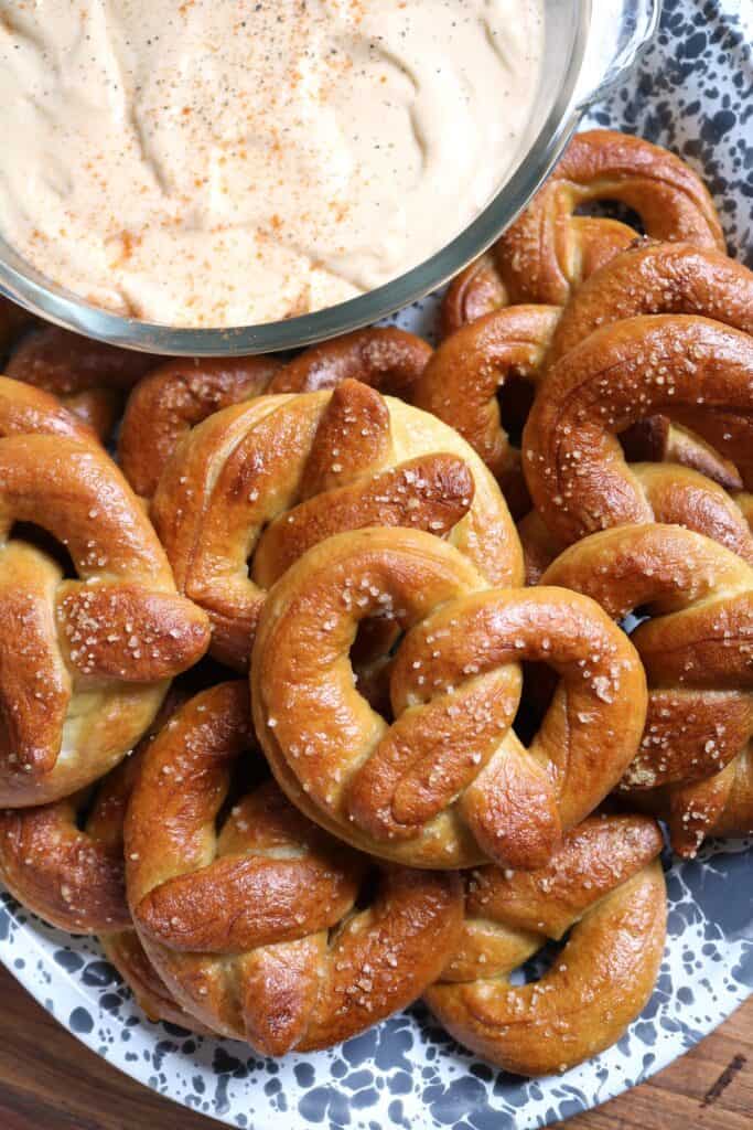 Platter of Homemade Soft Pretzels with Cheese Dip.