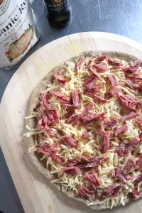 Reuben Pizza Toppings with Guinness Crust.