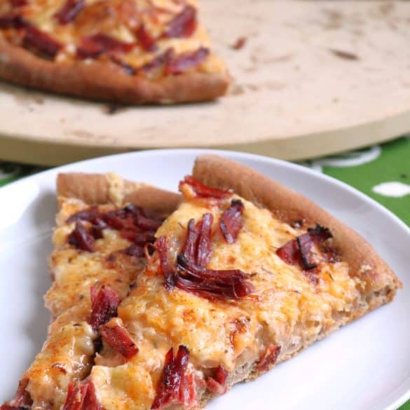 Slices of Reuben Pizza.