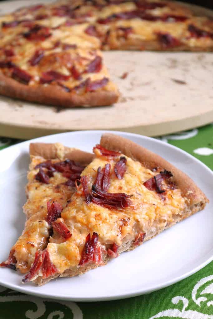 Slices of Reuben Pizza.