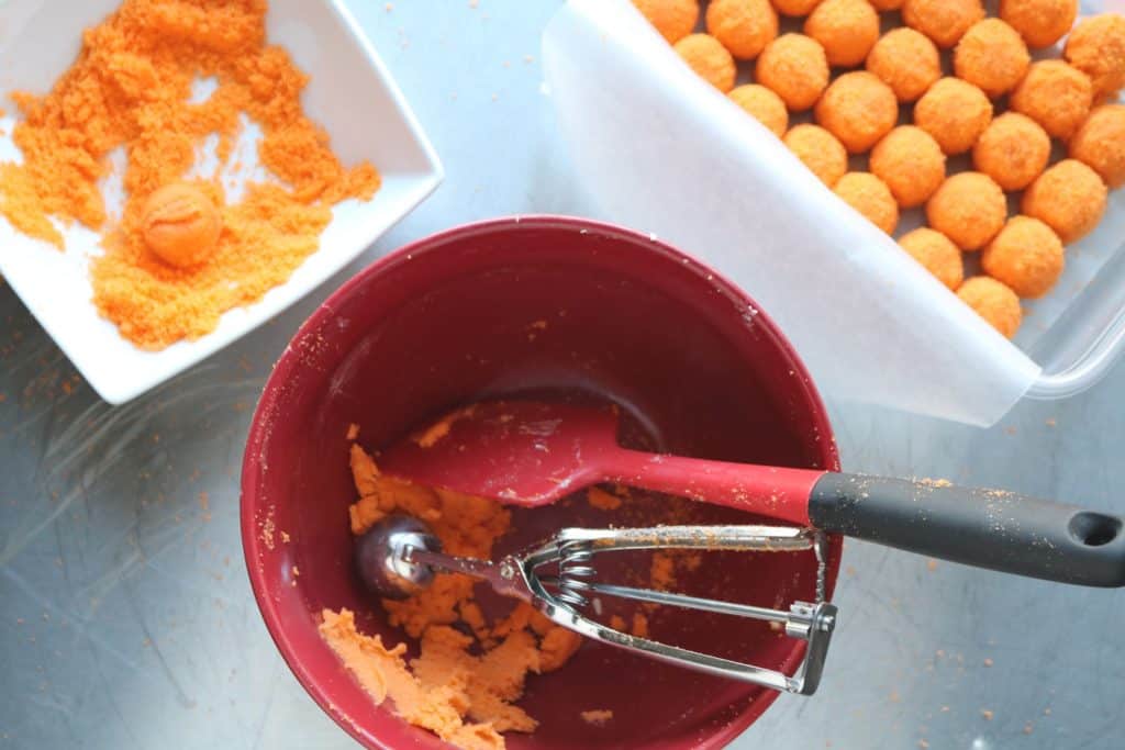 Rolling the Cheetos Cookies Dough.