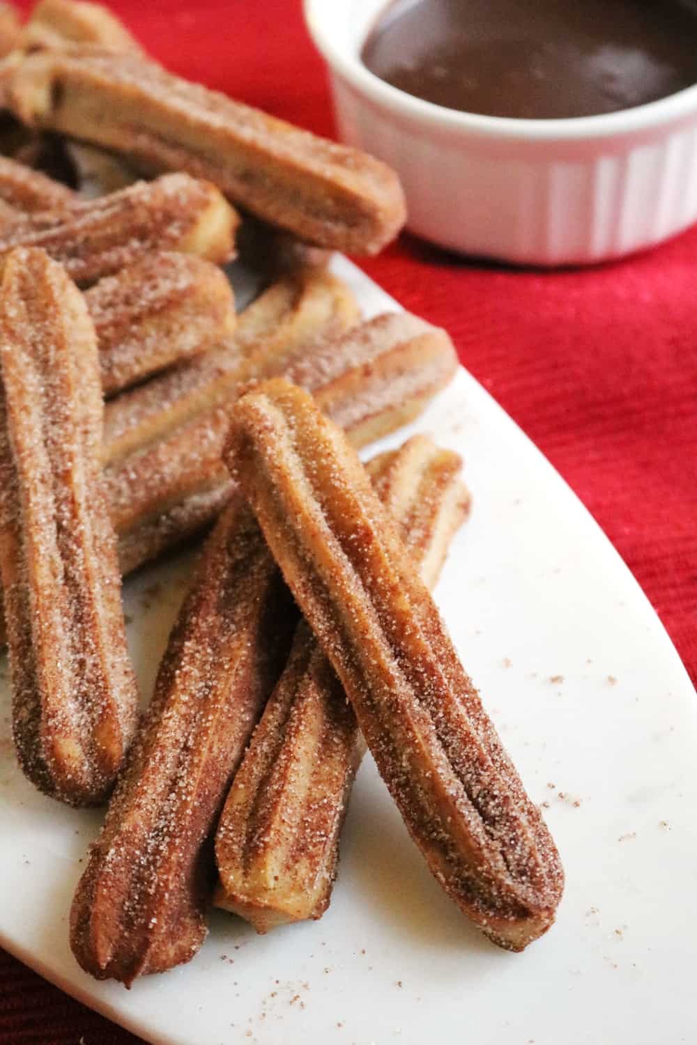 Baked Peanut Butter Churros with Chocolate Caramel Sauce
