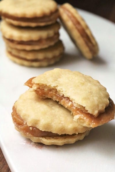 Lemon Cookies with Caramelized Milk Jam by The Spiffy Cookie #holidaybaking #recipe #sandwichcookies
